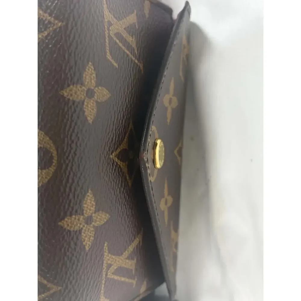 Louis Vuitton Victorine wallet in Monogram canvas SPB JA-368821